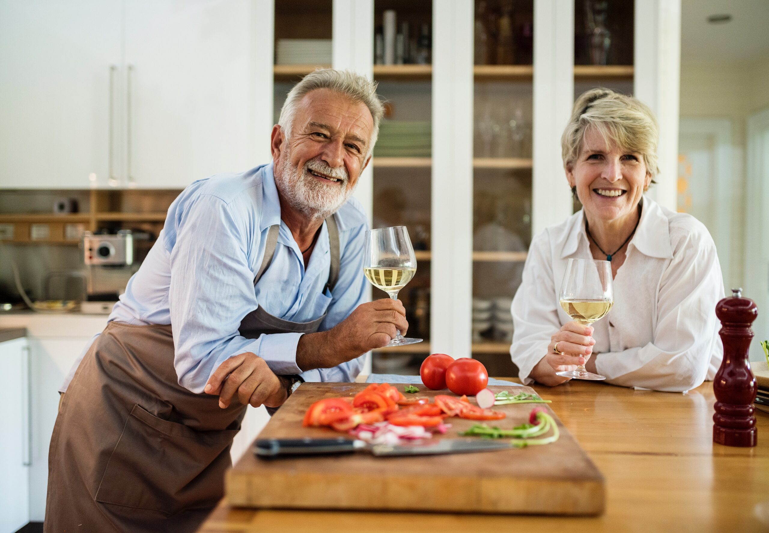 retired couple in kitchen